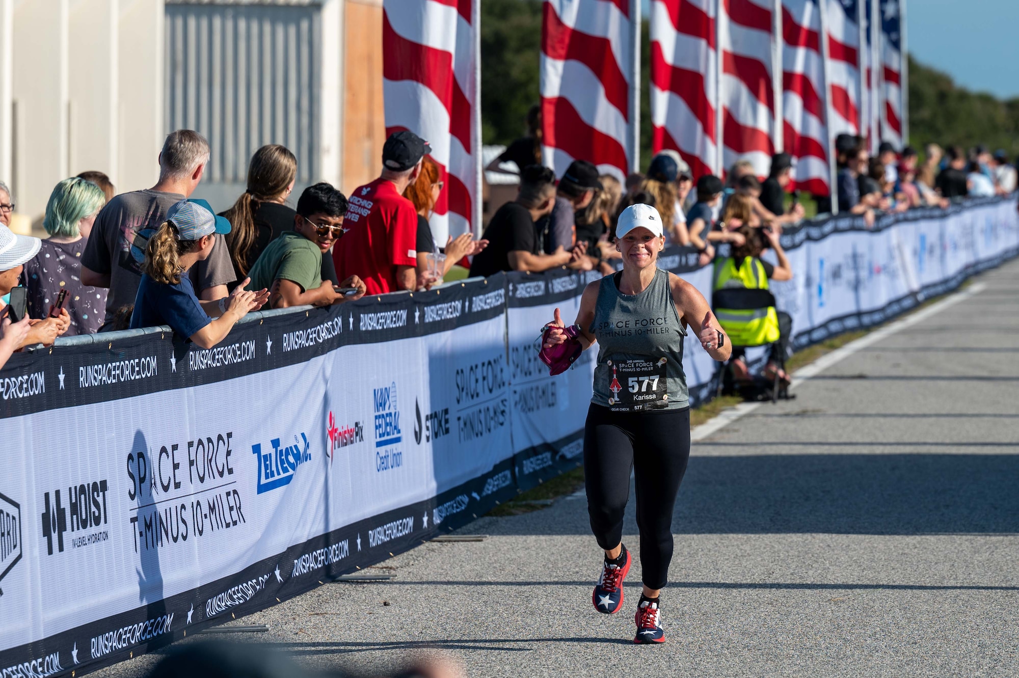 U.S. Air Force Chief Master Sgt. Karissa Gunter, SLD 45 Senior Enlisted Airman runs at the T-Minus 10-Miler at Cape Canaveral Space Force Station, Florida, Dec. 9, 2023. The T-Minus 10-Miler celebrates the Space Forces birthday. (U.S. Space Force photo by Senior Airman Samuel Becker)