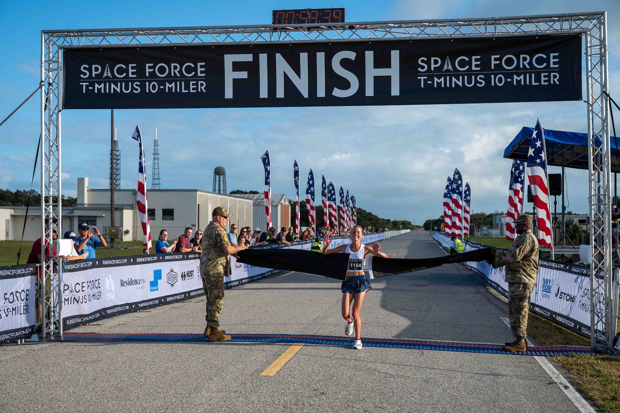 T-Minus 10-Miler participant crosses finish line at Cape Canaveral Space Force Station, Florida, Dec. 9, 2023. The T-Minus 10-Miler celebrates the Space Forces birthday. (U.S. Space Force photo by Senior Airman Samuel Becker)