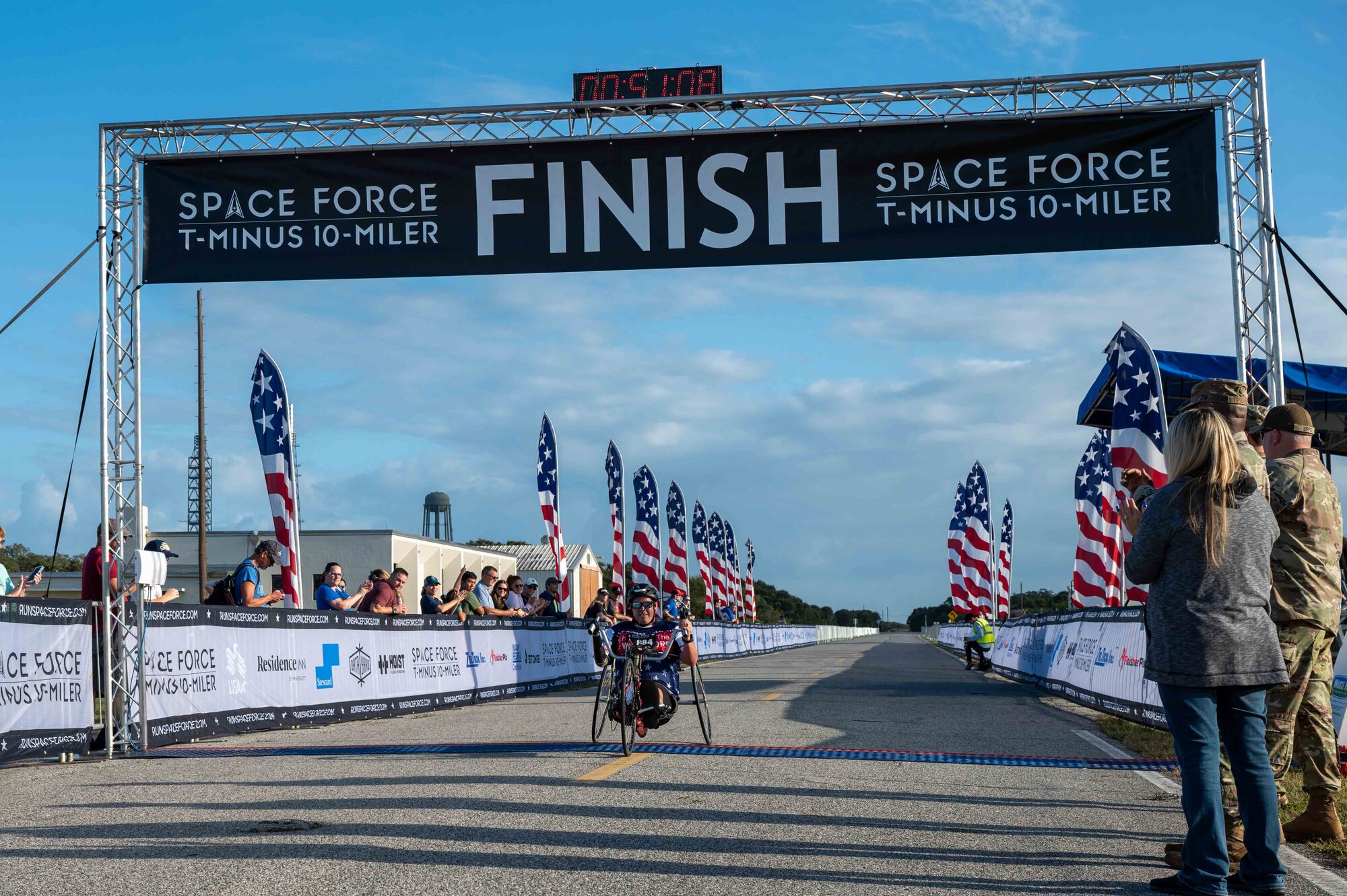 T-Minus 10-Miler participant crosses finish line at Cape Canaveral Space Force Station, Florida, Dec. 9, 2023. The T-Minus 10-Miler celebrates the Space Forces birthday. (U.S. Space Force photo by Senior Airman Samuel Becker)