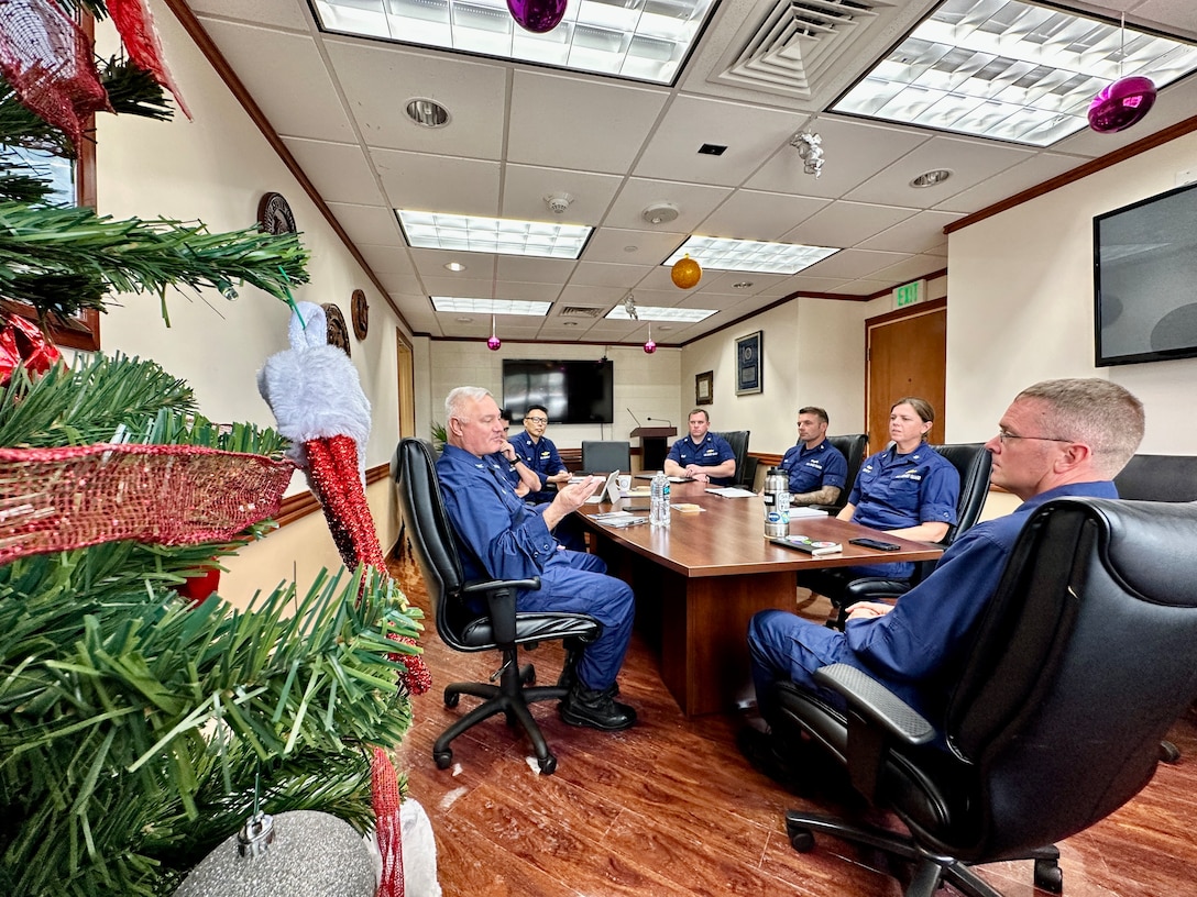 Father Daniel Mode, chaplain of the U.S. Coast Guard, visits with U.S. Coast Guard Team Guam during a visit to Guam from Dec. 2-6, 2023. Mode’s military service commenced in 1988, encompassing various roles across the Navy and Marine Corps, including deployments supporting Operations Enduring Freedom and Iraqi Freedom. This is his second tour as a U.S. Coast Guard chaplain. (U.S. Coast Guard photo by Chief Warrant Officer Sara Muir)