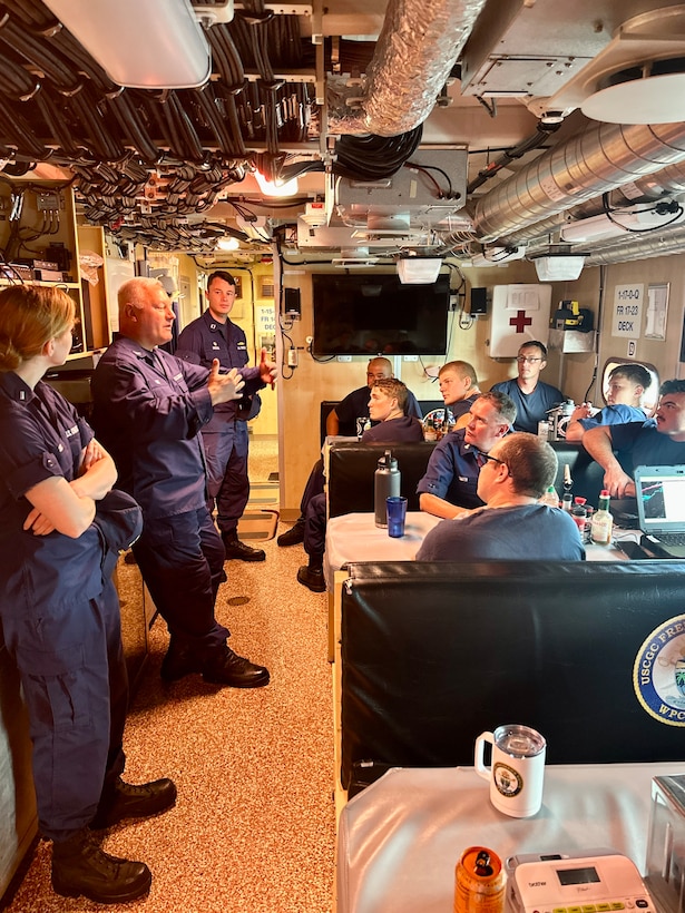 Father Daniel Mode, chaplain of the U.S. Coast Guard, visits with U.S. Coast Guard Team Guam during a visit to Guam from Dec. 2-6, 2023. Mode’s military service commenced in 1988, encompassing various roles across the Navy and Marine Corps, including deployments supporting Operations Enduring Freedom and Iraqi Freedom. This is his second tour as a U.S. Coast Guard chaplain. (U.S. Coast Guard photo by Chief Warrant Officer Sara Muir)