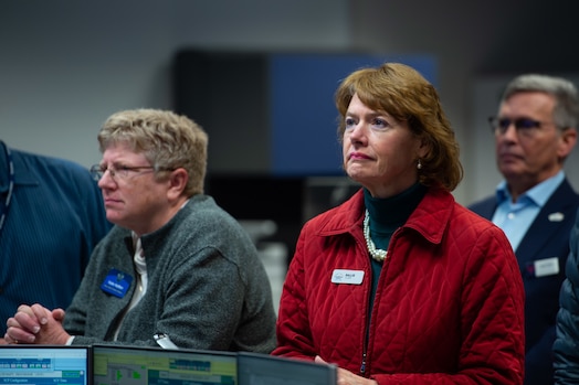  Civic leaders listen to GPS briefing.