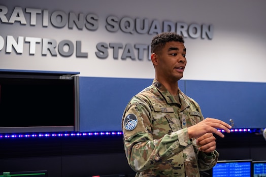  Space Force Sgt, Khiry Loyd gives a briefing to civic leaders.