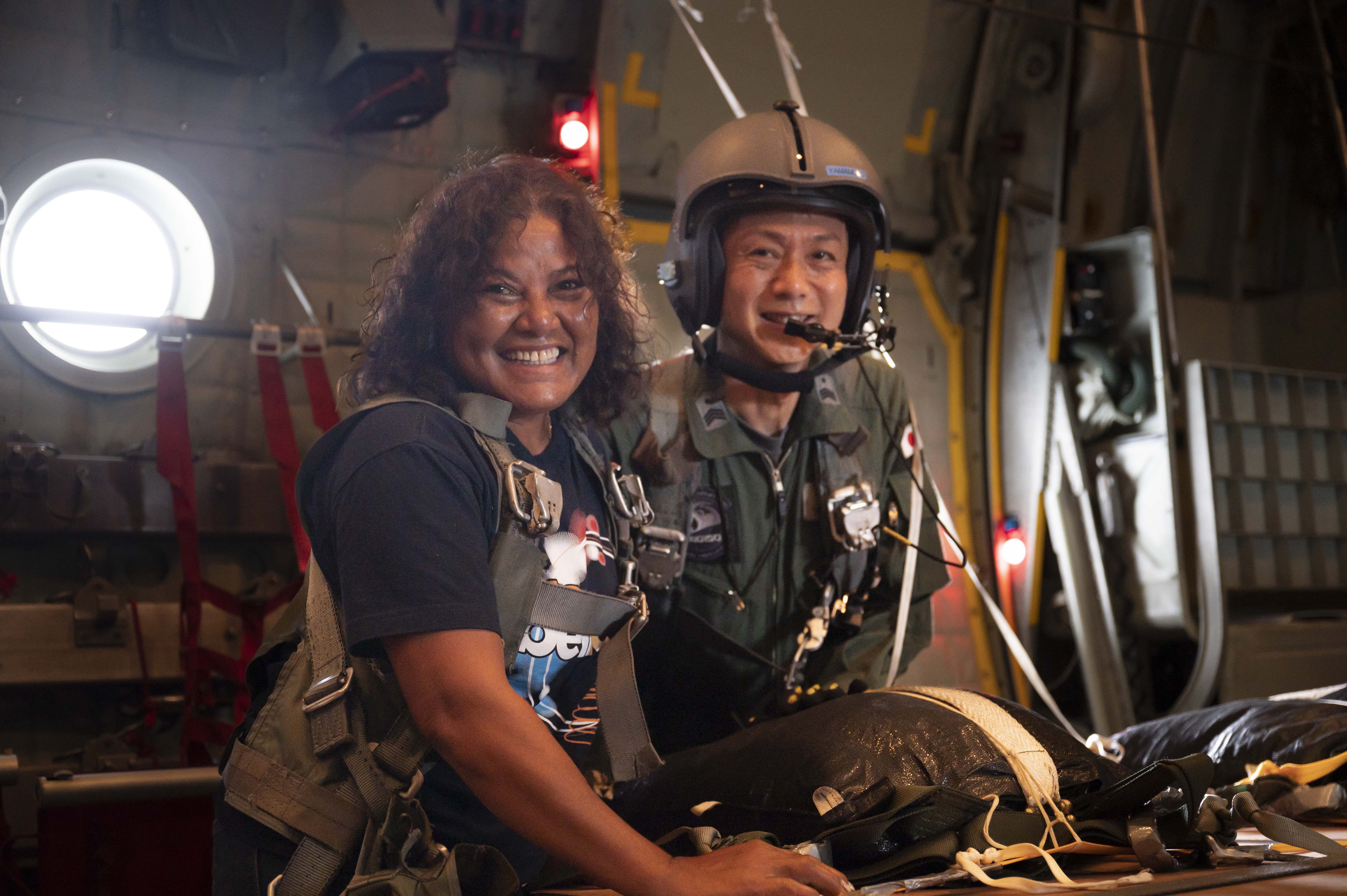 Heart happy A Mokil Atoll native helps drop humanitarian aid to her