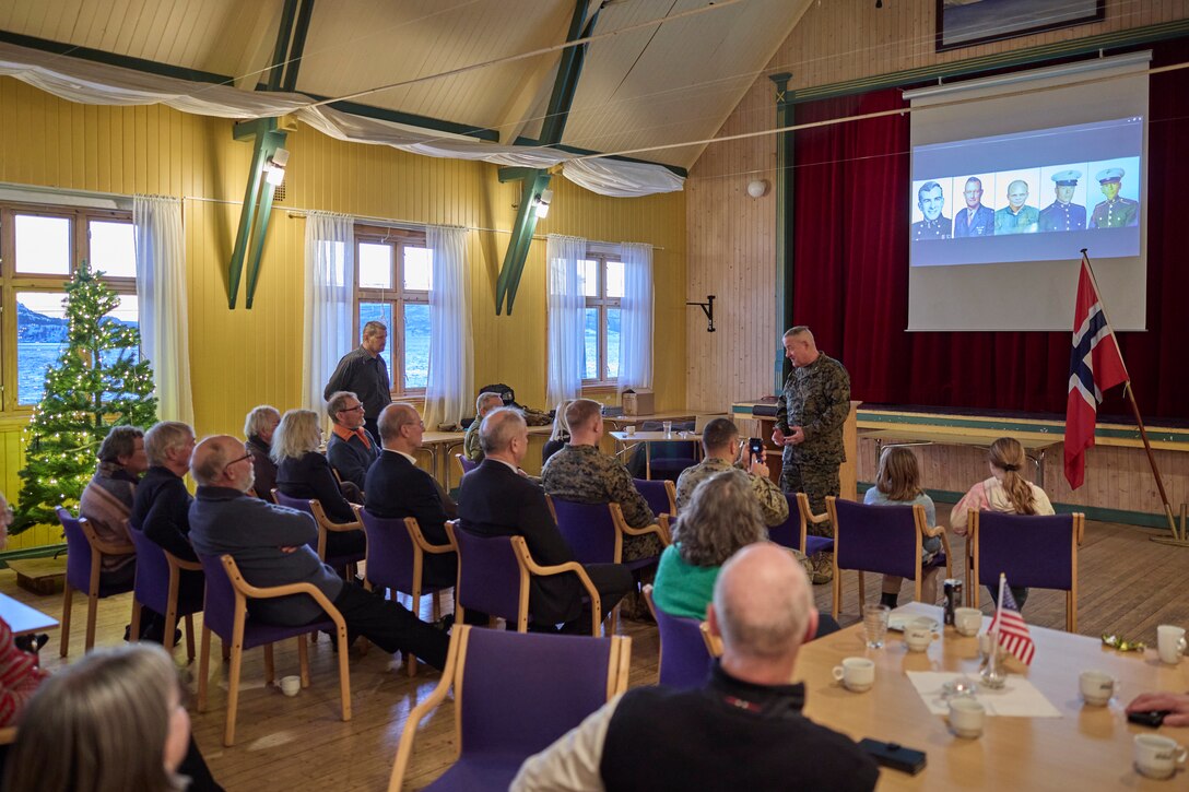 U.S. Marine Corps Maj. Gen. Robert B. Sofge Jr., commander of U.S. Marine Corps Forces Europe and Africa, gives a speech at the Town Hall on Grytoya Island, Norway on Dec. 9, 2023. Sofge convened with the Mayor of Harstad, Norwegian military personnel, and residents who are connected to the story of "Short Stop 24". This engagement showcased the robust bond between the Marines and Norwegians, fostering ongoing collaboration and fortifying the enduring partnership between the Marines and the people of Harstad, Norway. (U.S. Marine Corps photo by Lance Cpl. Mary Linniman)