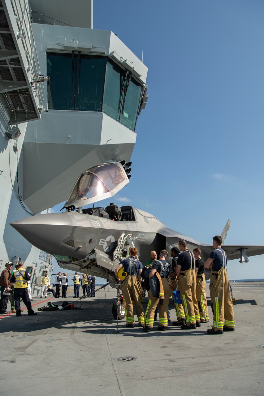 It takes an integrated team to successfully conduct F-35B developmental phase 3 (DT-3) flight trials aboard the U.K.’s biggest warship. Two or more teams combining into one begins with a willingness to do so, two-way communication, detailed planning, thorough preparation, and continues throughout execution. A fortnight into this deployment, the PAX ITF test team and HMS Prince of Wales ship’s company are bearing the fruit of work done before they got underway. And, bearing down—together—on the goals for the trials