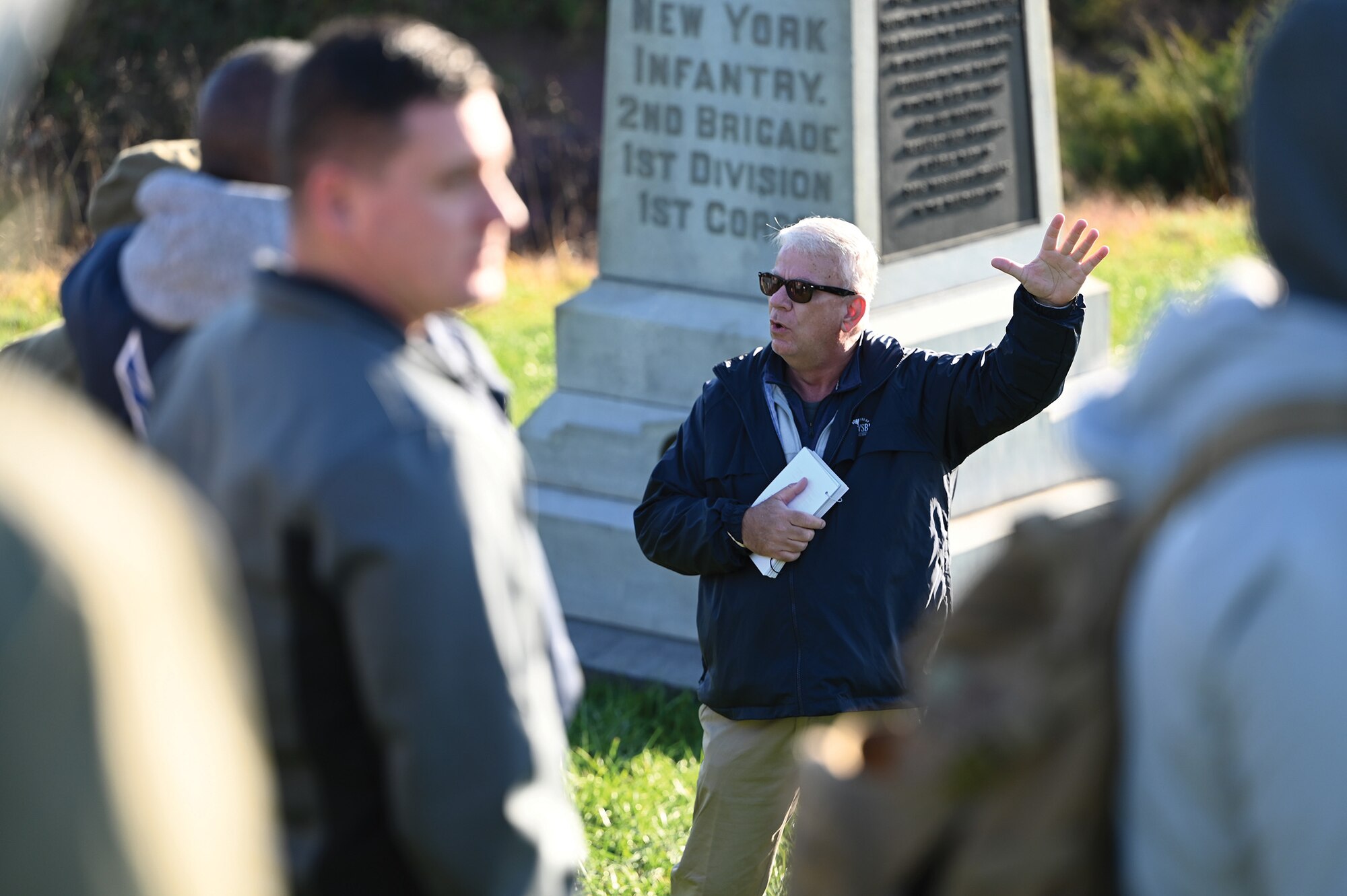 Col. Donald Wren, 445th Mission Support Group commander, addresses military members at the New York 95th Infantry, 2nd Brigade, 1st Division, 1st Corps monument, during the Gettysburg Leadership Staff Ride, Pennsylvania, Oct. 24, 2023. (U.S. Air Force photo/Master Sgt. Patrick O’Reilly)