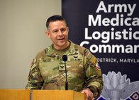 Col. Marc Welde, commander of U.S. Army Medical Logistics Command, offers remarks during a change of responsibility ceremony Dec. 8, 2023, at Fort Detrick, Maryland. During the ceremony, Sgt. Maj. Akram Shaheed passed his senior enlisted leader role to Command Sgt. Maj. Gabriel Wright. (C.J. Lovelace)