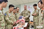Oregon Air National Guard Lt. Col. Chris Webb demonstrates airway management skills during an International Trauma Life Support course in Ho Chi Minh City, Vietnam, in February 2023. The Oregon National Guard and Vietnam are partners through the State Partnership Program.