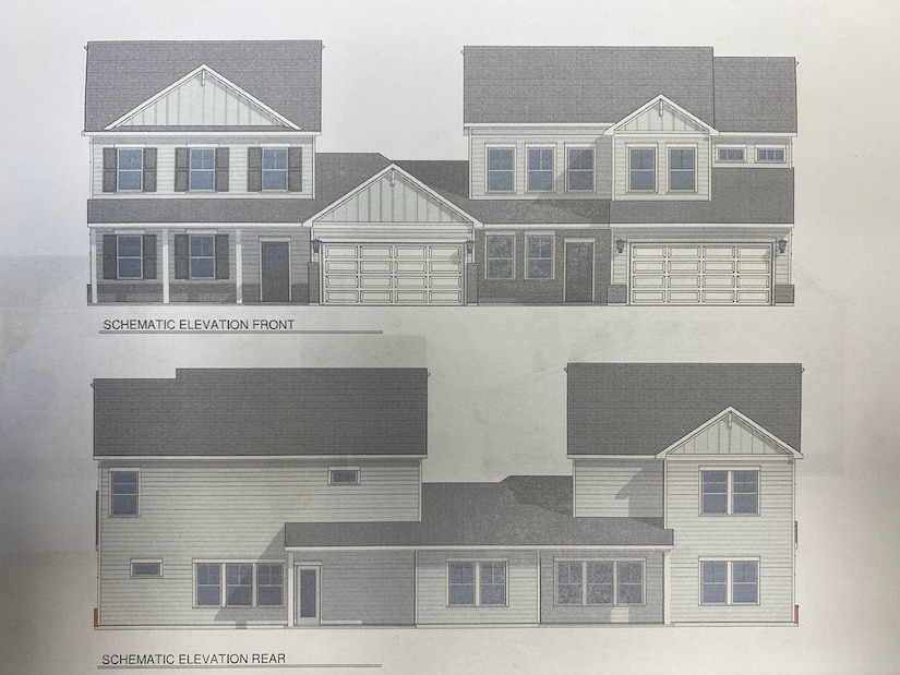 Illustration showing both the front and back of two condominium homes with white siding and grey bricks.