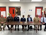Seven medical professionals from Keesler Medical Center, Biloxi Miss., traveled to Pascagoula High School on Nov. 30 to interact with Health Occupation Students of America program students.  The team shared their medical journey, assignments, deployments, their path to college, and pointers on applying for financial aid.
