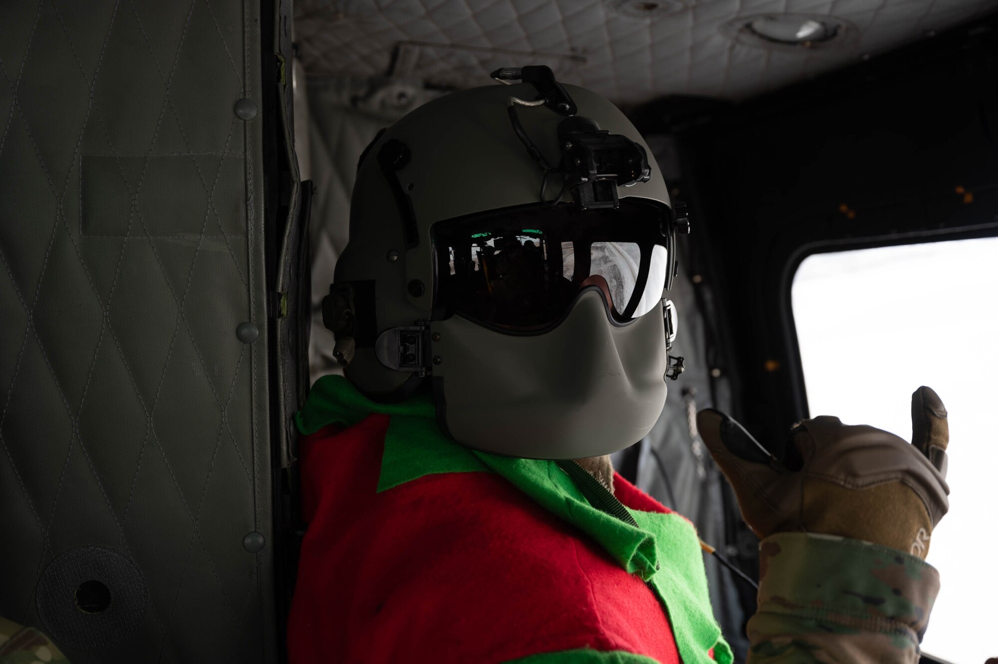 The 54th Helicopter Squadron takes Santa Claus and an elf for a ride in a UH-1N Iroquois at Minot Air Force Base, North Dakota on December 10, 2023. Claus and his elf flew over Minot Air Force Base and Minot, N.D. to wave at kids and members of Team Minot. (U.S. Air Force photo by A1C Luis Gomez)