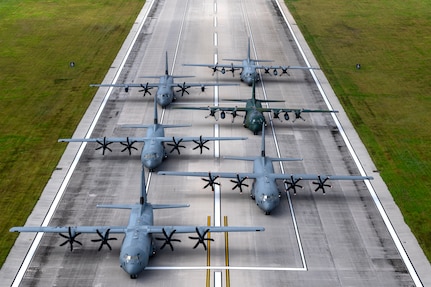 Three U.S. Air Force (USAF) C-130J Super Hercules aircraft assigned to the 36th Expeditionary Airlift Squadron participate in an elephant walk alongside a Royal Canadian Air Force (RCAF) C-130J Super Hercules assigned to the 436th Transport Squadron, a Japan Air Self-Defense Force (JASDF) C-130H Hercules assigned to the 401st Tactical Airlift Squadron, and a Republic of Korea Air Force (ROKAF) C-130H Hercules assigned to the 251st Airlift Squadron, at Andersen Air Force Base, Guam, Dec. 9, 2023, during Operation Christmas Drop 2023 (OCD 23). USAF, RCAF, JASDF, and ROKAF crewmembers delivered 210 bundles to 58 islands over the span of six days. The deliveries of humanitarian aid reached over 42 thousand remote Micronesian islanders across 1.8 million square miles. (U.S. Air Force photo by Tech. Sgt. Taylor Altier)