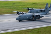 A Royal Canadian Air Force (RCAF) C-130J Super Hercules assigned to the 436th Transport Squadron and a U.S. Air Force (USAF) C-130J Super Hercules aircraft assigned to the 36th Expeditionary Airlift Squadron participate in an elephant walk alongside a Japan Air Self-Defense Force (JASDF) C-130H Hercules assigned to the 401st Tactical Airlift Squadron, and a Republic of Korea Air Force (ROKAF) C-130H Hercules assigned to the 251st Airlift Squadron, at Andersen Air Force Base, Guam, Dec. 9, 2023, during Operation Christmas Drop 2023 (OCD 23). USAF, RCAF, JASDF, and ROKAF crewmembers delivered 210 bundles to 58 islands over the span of six days. The deliveries of humanitarian aid reached over 42 thousand remote Micronesian islanders across 1.8 million square miles. (U.S. Air Force photo by Tech. Sgt. Taylor Altier)