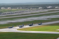 Three U.S. Air Force (USAF) C-130J Super Hercules aircraft assigned to the 36th Expeditionary Airlift Squadron participate in an elephant walk alongside a Royal Canadian Air Force (RCAF) C-130J Super Hercules assigned to the 436th Transport Squadron, a Japan Air Self-Defense Force (JASDF) C-130H Hercules assigned to the 401st Tactical Airlift Squadron, and a Republic of Korea Air Force (ROKAF) C-130H Hercules assigned to the 251st Airlift Squadron, at Andersen Air Force Base, Guam, Dec. 9, 2023, during Operation Christmas Drop 2023 (OCD 23). USAF, RCAF, JASDF, and ROKAF crewmembers delivered 210 bundles to 58 islands over the span of six days. The deliveries of humanitarian aid reached over 42 thousand remote Micronesian islanders across 1.8 million square miles. (U.S. Air Force photo by Tech. Sgt. Taylor Altier)