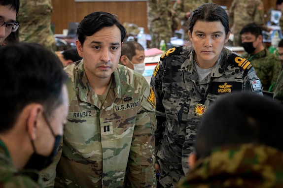 Japanese, U.S., and Australian participants take part in a rehearsal during Yama Sakura 85 at Camp Higashi-Chitose, Japan, Dec. 11, 2023. As a part of U.S. Army Pacific's Operation Pathways, the 43rd iteration of Yama Sakura exercise, YS-85, is the first U.S. Army, Japan Ground Self-Defense Force, and Australian Army command post exercise based in Japan. (U.S. Army photo by Spc. Austin Robertson)