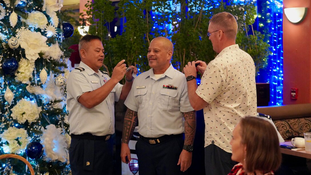 The U.S. Coast Guard Auxiliary Flotilla 140-02-24 conducted its annual Change of Watch ceremony on Dec. 5, 2023, in Hagatna, Guam. The event marked a transition in leadership and celebrated the Auxiliary's ongoing commitment to maritime safety and community service. (U.S. Coast Guard photo by Chief Warrant Officer Sara Muir)