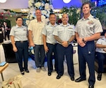 The U.S. Coast Guard Auxiliary Flotilla 140-02-24 conducted its annual Change of Watch ceremony on Dec. 5, 2023, in Hagatna, Guam. The event marked a transition in leadership and celebrated the Auxiliary's ongoing commitment to maritime safety and community service. (U.S. Coast Guard photo by Chief Warrant Officer Sara Muir)