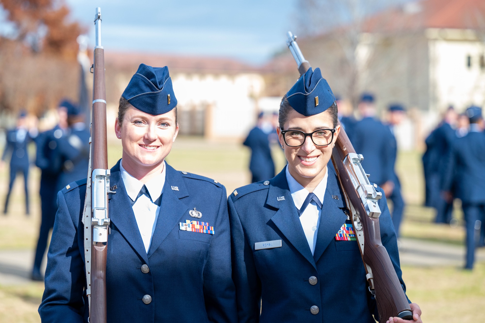 U.S. Air Force and U.S. Space Force newly commissioned officers celebrating after Officer Training School Victory graduation, December 8, 2023, at Welch Field, Maxwell Air Force Base, Alabama. Newly commissioned officers throw there covers in the air after graduating OTS. (U.S. Air Force photo by Airman Tyrique Barquet)