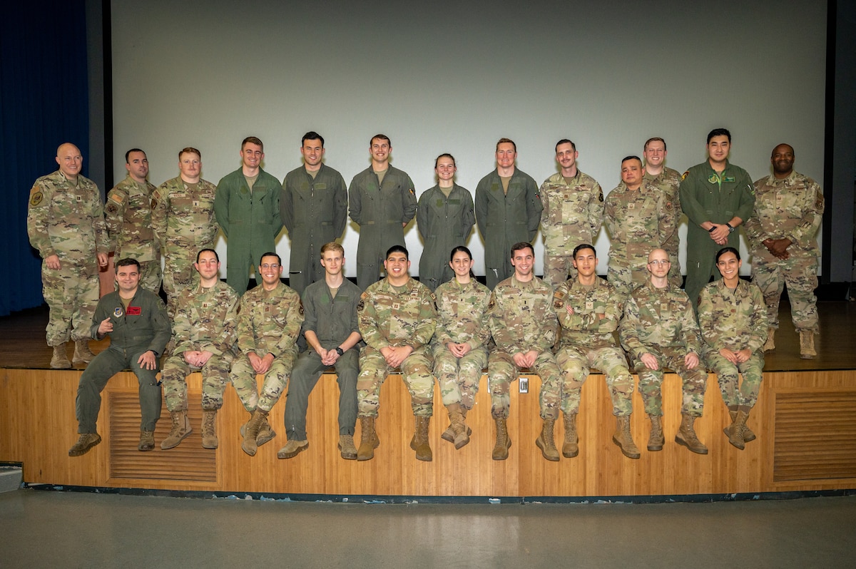 The 51st Fighter Wing combat agility verification working group poses for a photo after the base’s first wing combat verification brief at Osan Air Base, Republic of Korea, Dec. 8, 2023. The verification assessed the 51st FWs ability to effectively execute aircraft dispersal, known as combat agility or agile combat employment, to enhance survivability and ensure the projection of airpower against adversaries in any situation or location. (U.S. Air Force photo by Staff Sgt. Thomas Sjoberg)