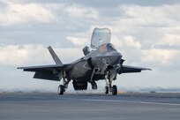 An F-35B Lightning II short takeoff vertical landing (STOVL) variant fighter jet piloted by a test pilot performs a shipborne rolling vertical landing aboard U.K. aircraft carrier HMS Prince of Wales Oct. 24, 2023. The 5th generation strike aircraft for Navy, Air Force, Marines, and allies is aboard to conduct developmental test phase 3 (DT-3) flight trials during the ship's deployment to the U.S. Eastern Seaboard for WESTLANT 2023. A Pax River F-35 Integrated Test Force (Pax ITF) team is working closely with the ship's company to conduct the sea trials that continue pushing the boundaries of carrier aviation.