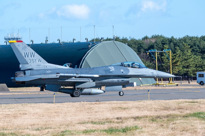 A U.S. Air Force pilot taxis an F-16 Fighting Falcon during a PAC WEASEL Exercise at Misawa Air Base, Japan, Dec. 8, 2023.