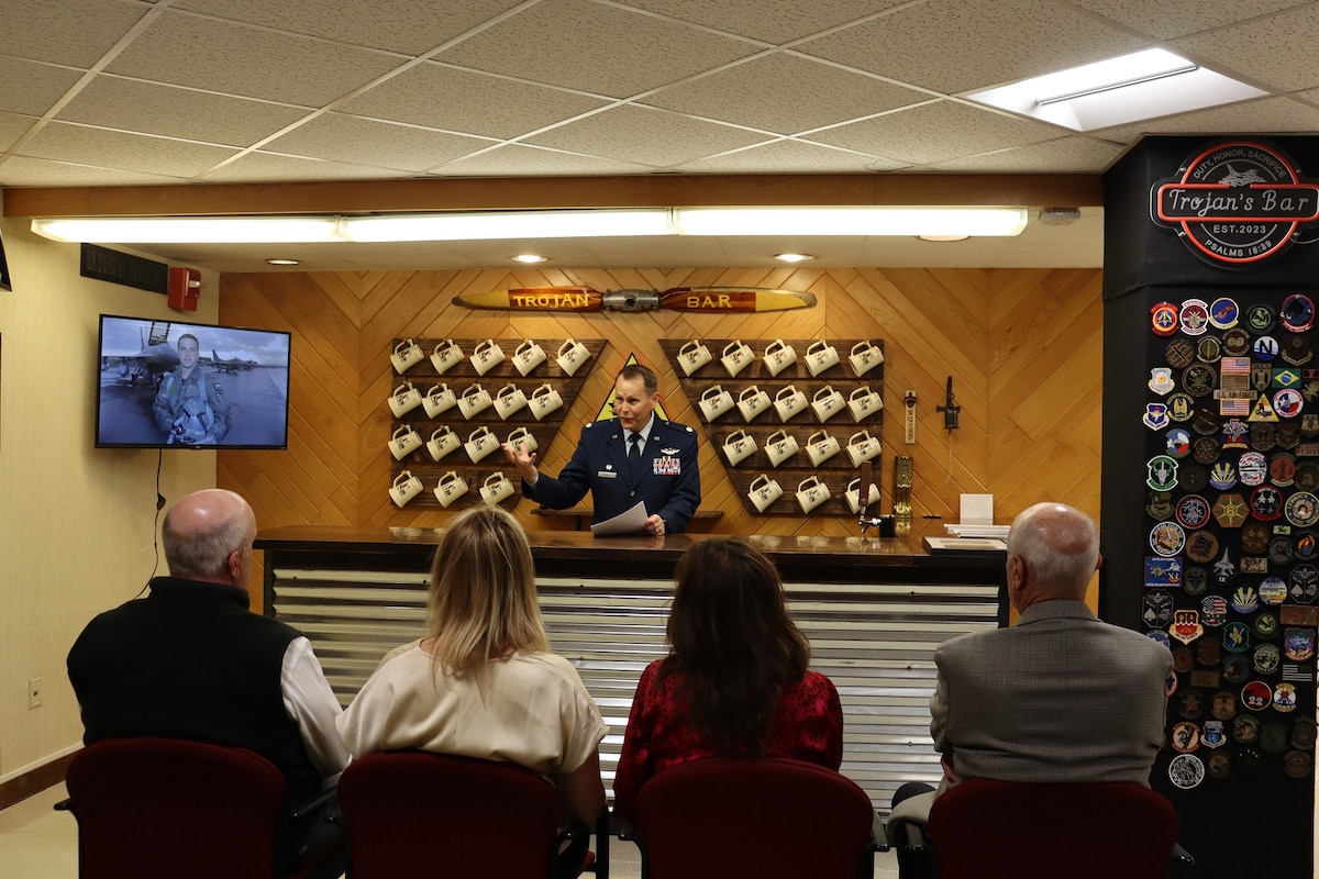 Air Force ROTC Detachment Commander Lt. Col. Daniel O’Brien delivers remarks at the dedication ceremony for the new ‘Trojan Bar,’ Nov. 17, 2023, at Texas Tech University, Lubbock, Texas. The detachment dedicated a heritage room in honor of Maj. Troy ‘Trojan’ Gilbert, a Texas Tech alum and F-16 pilot who lost his life while executing a low-level strafing pass during Operation Iraqi Freedom in 2006. The university also unveiled a commemorative plaque in its Memorial Circle to honor Gilbert as part of its centennial celebration. (U.S. Air Force photo by Cadet Kendall Jones)