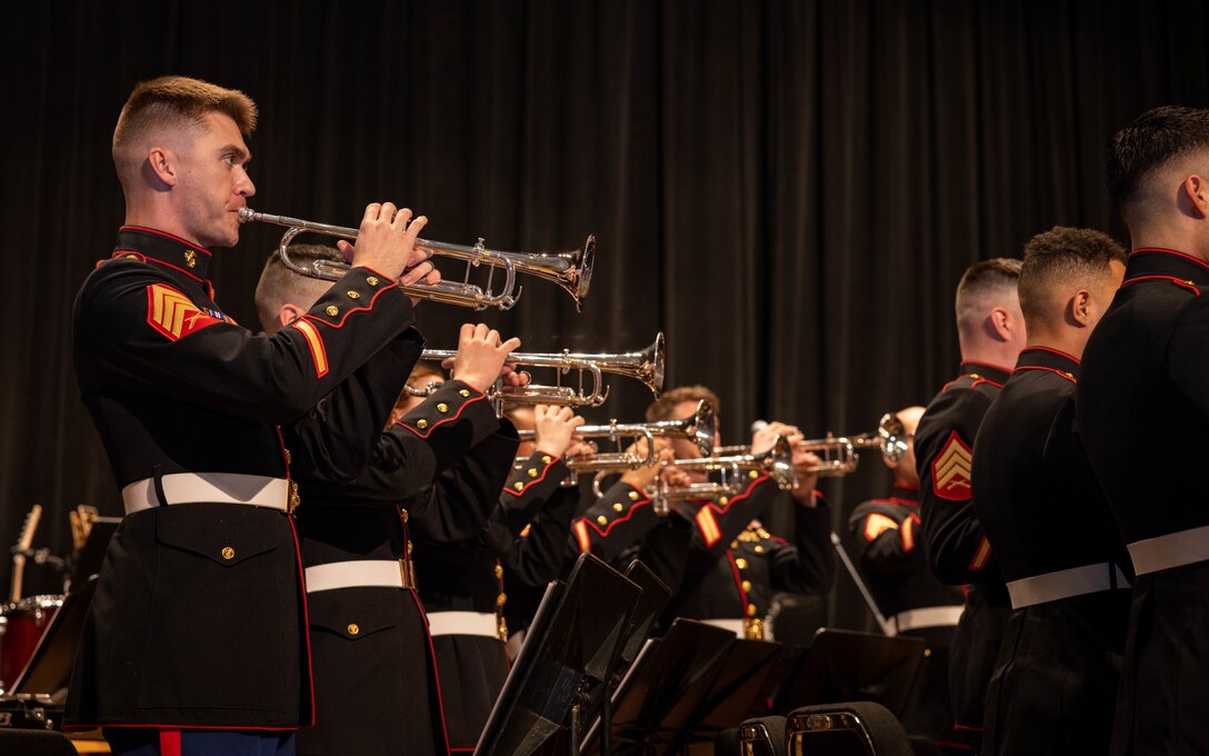 U.S. Marines with the Quantico Marine Corps Band perform during the annual Holiday Concert at Little Hall on Marine Corps Base Quantico, Virginia, Dec. 10, 2023. The band’s mission is to provide musical support that will encourage community relations, enhance troop morale, and promote the Marine Corps recruiting program through its demanding performance schedule. (U.S. Marine Corps photo by Cpl. Mitchell Johnson)
