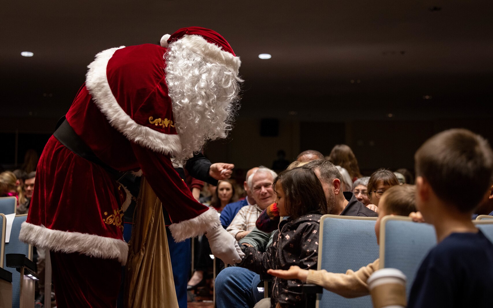 U.S. Marines with the Quantico Marine Corps Band perform during the annual Holiday Concert at Little Hall on Marine Corps Base Quantico, Virginia, Dec. 10, 2023. The band’s mission is to provide musical support that will encourage community relations, enhance troop morale, and promote the Marine Corps recruiting program through its demanding performance schedule. (U.S. Marine Corps photo by Cpl. Mitchell Johnson)