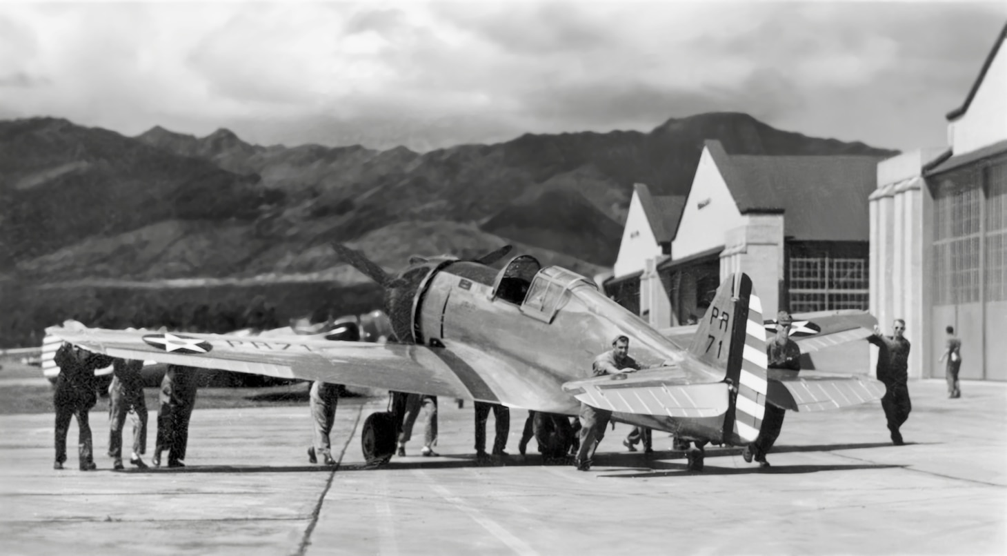 A P-36A of the 18th Pursuit Group is rolled to its position on Wheeler’s parking apron in 1940. Most P-36s were unpainted, as opposed to the olive-green P-40s that shared the defense duty around the bases in the Pearl Harbor complex.