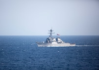 ATLANTIC OCEAN (Aug. 30, 2018) The guided-missile destroyer USS Arleigh Burke (DDG 51) from Destroyer Squadron 28 steams alongside the Nimitz-class aircraft carrier USS Abraham Lincoln (CVN 72). The USS Abraham Lincoln Carrier Strike Group and USS Harry S. Truman Carrier Strike Group are participating in dual-carrier sustainment and qualification operations in the Atlantic Ocean. In addition to demonstrating the Navy's inherent flexibility and scalability, this evolution provides the opportunity to conduct complex, multi-unit training to enhance maritime interoperability and combat readiness, and prepare the Navy to protect our homeland and preserve and promote peace anywhere around the world. (U.S. Navy photo by Mass Communication Specialist 1st Class Brian M. Wilbur/Released)