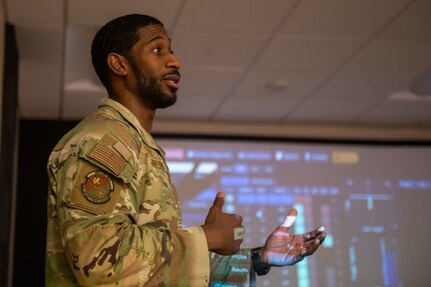 U.S. Air Force Tech. Sgt. Kourtlyn Stafford, 628th Security Forces Squadron training non-commissioned officer in charge, gives a briefing about the firearms simulator training system at Joint Base Charleston, South Carolina, Dec. 7, 2023.