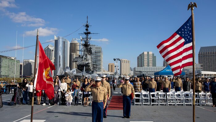 U.S. Marine Corps 1st Sgt. Christian Fuentes, Company First Sergeant with Third Recruit Training Battalion, Marine Corps Recruit Depot San Diego salutes during his retirement ceremony aboard the USS Midway (CV-41) Museum, San Diego, Dec. 7, 2023. Fuentes retired after 21 years of faithful service and held his retirement ceremony on the remembrance day of Pearl Harbor, to commemorate and honor the fallen service members. (U.S. Marine Corps photo by Sgt. Yvonna Guyette)