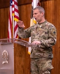Chief Warrant Officer 2 Peter E. Warren, Jr., of Springfield, Illinois, a Force Integration Readiness Officer in the Illinois Army National Guard, thanks family, friends, and fellow Soldiers, for their support during a retirement ceremony Dec. 8 at Camp Lincoln, Springfield, Illinois.