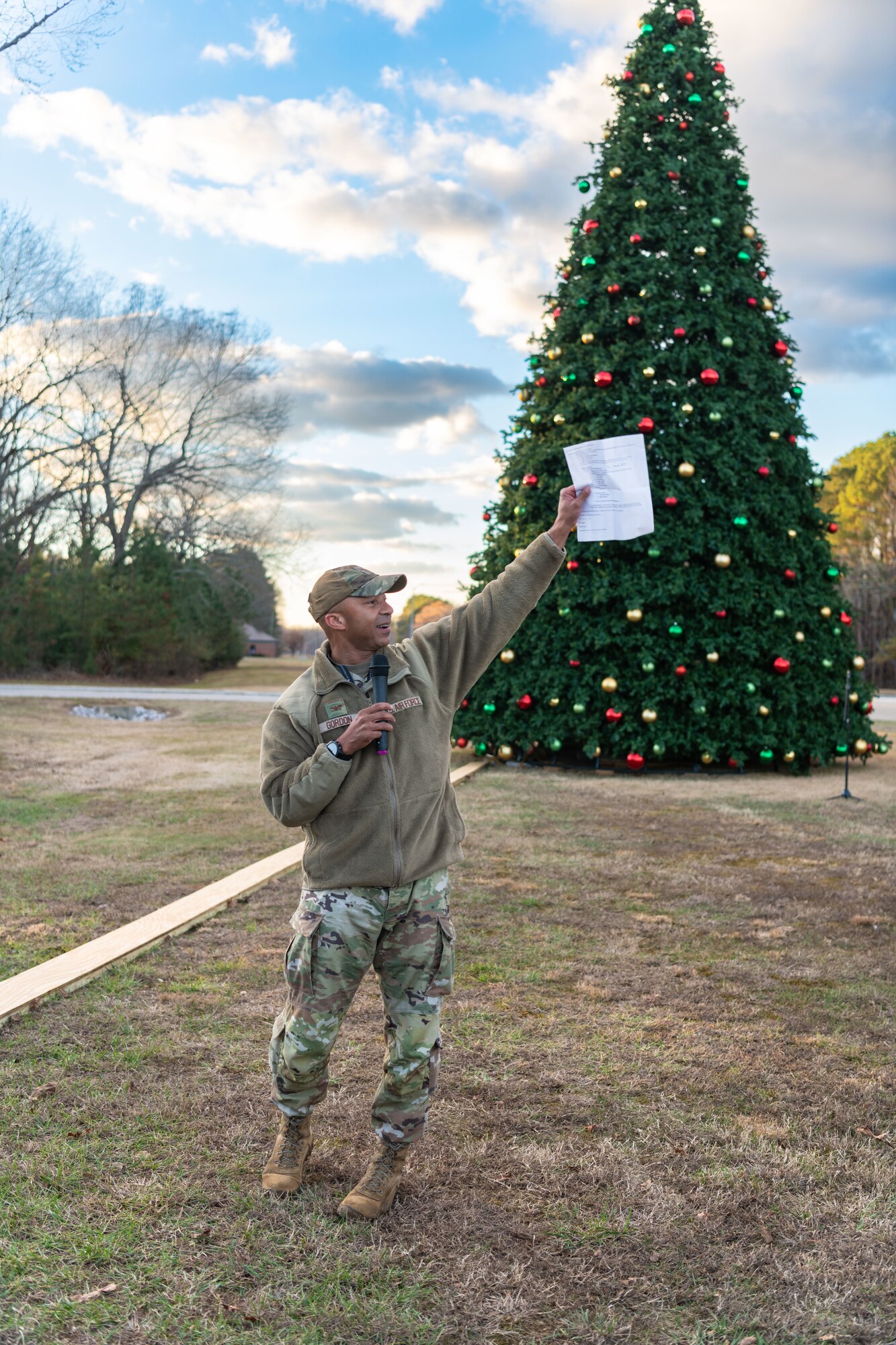 The Christmas tree at Arnold Air Force Base, Tenn., is lit during a lighting ceremony Dec. 4, 2023. The tree measures 40 feet tall and 22 feet wide. It is decorated with approximately 300 ball ornaments and is topped with a 5-foot 3D five-point star. (U.S. Air Force photo by Keith Thornburgh)