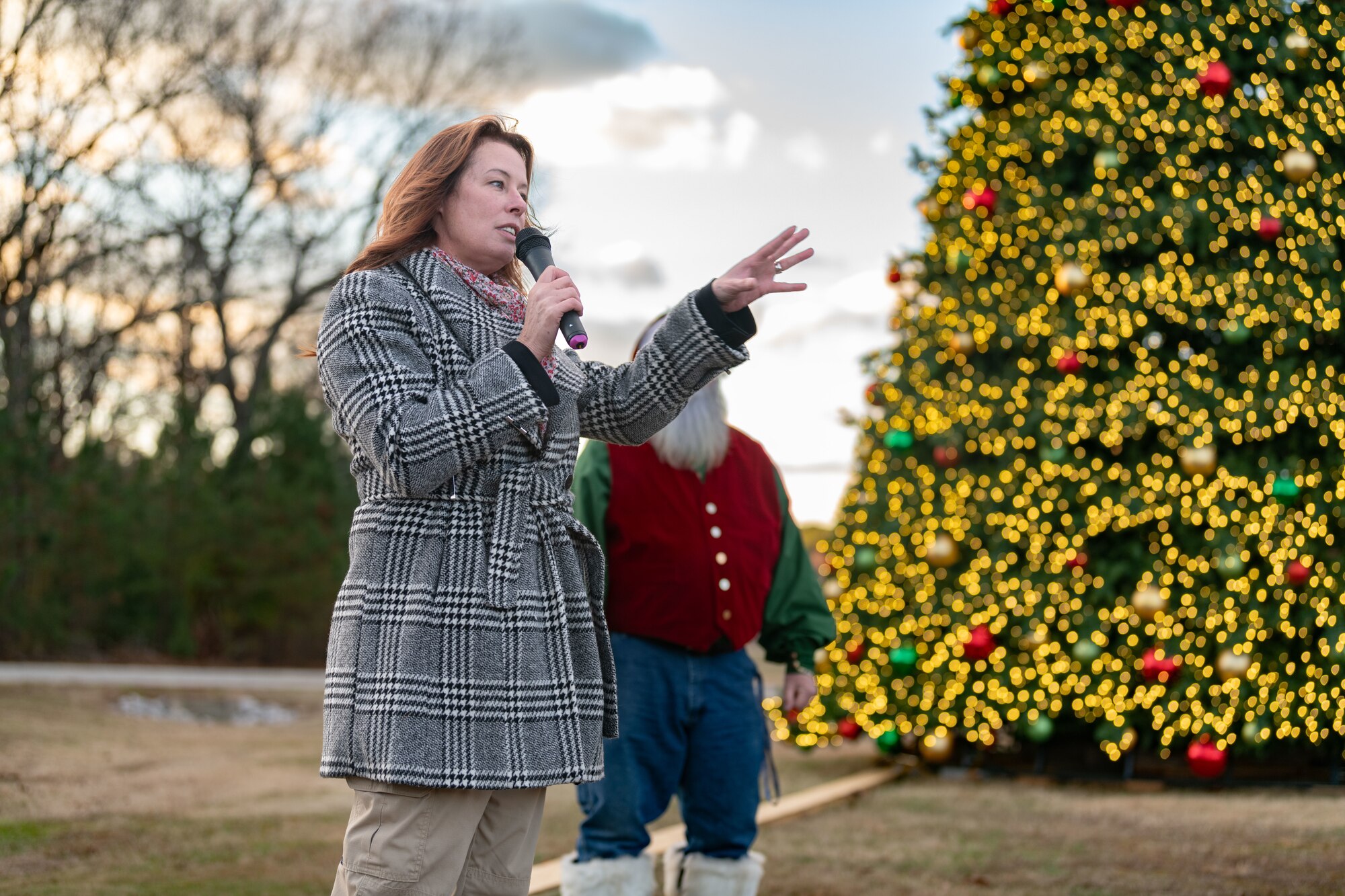 The Christmas tree at Arnold Air Force Base, Tenn., is lit during a lighting ceremony Dec. 4, 2023. The tree measures 40 feet tall and 22 feet wide. It is decorated with approximately 300 ball ornaments and is topped with a 5-foot 3D five-point star. (U.S. Air Force photo by Keith Thornburgh)