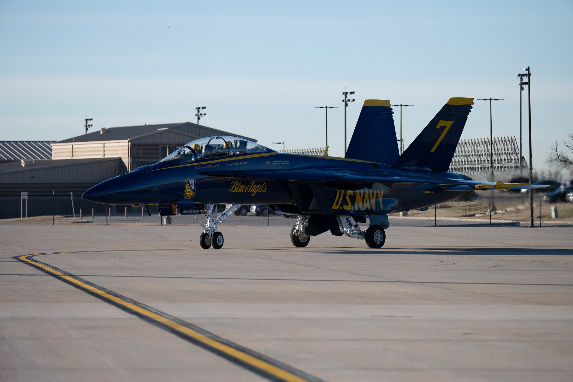 A U.S. Navy Flight Demonstration Squadron F/A-18 Super Hornet taxis Dec. 11, 2023, at McConnell Air Force Base, Kansas. The Blue Angels performed a site survey and talked with local civic leaders and media in preparation for McConnell’s Frontiers in Flight Airshow on August 24-25, 2024. (U.S. Air Force photo by Airman 1st Class Felicia Przydzial)