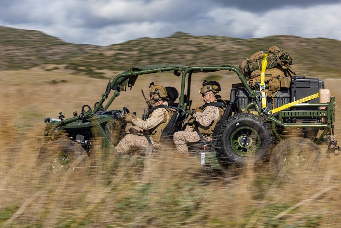 U.S. Marines with 5th Marine Regiment, 1st Marine Division, drive an Ultra Light Tactical Vehicle during a mission rehearsal exercise as part of Steel Knight 23.2 at Marine Corps Base Camp Pendleton, California, Nov. 30, 2023. Steel Knight maintains and sharpens I Marine Expeditionary Force as America’s expeditionary force in readiness – organized, trained and equipped to respond to any crisis, anytime, anywhere. This exercise will certify 5th Marines to be forward-postured in Australia as Marine Rotational Force - Darwin, a six-month deployment during which Marines train with Australian allies and facilitate rapid response to crises and contingencies. (U.S. Marine Corps photo by Lance Cpl. Juan Torres)