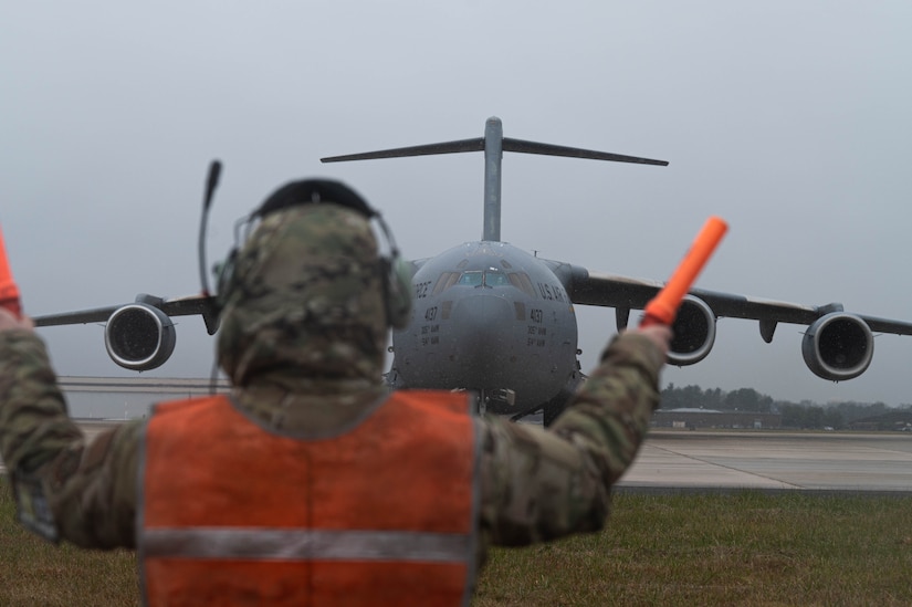 A C-17 Globemaster III taxis on the runway during Jersey Dawn 23 on Joint Base McGuire-Dix-Lakehurst, N.J., Dec. 7, 2023. Members assigned to several units across the joint base participated in the exercise, a six-day joint training event from Dec. 4-9, 2023. (U.S. Air Force photo by Airman 1st Class Aidan Thompson)