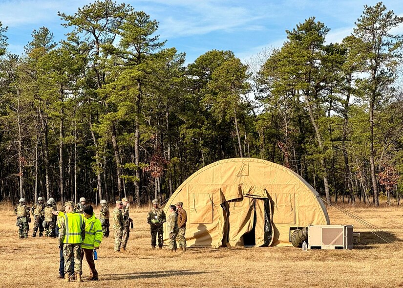 U.S. Air Force Airmen assigned to Joint Base McGuire-Dix-Lakehurst assemble a mock base during Jersey Dawn 23 at Naval Support Activity Lakehurst, N.J., Dec. 8, 2023. Members assigned to several units across the joint base participated in the exercise, a six-day joint training event from Dec. 4-9, 2023. (Courtesy photo)