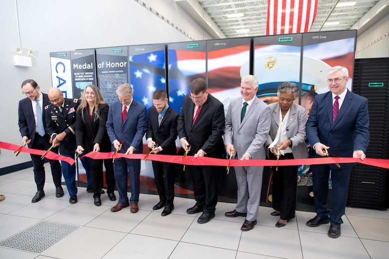 Officials from the U.S. Army Engineer Research and Development Center (ERDC) cut the ribbon for their newest supercomputer at the Information Technology Laboratory in Vicksburg, Mississippi, December 12, 2023. The system has been named “Carpenter” in recognition of Cpl. William “Kyle” Carpenter, the youngest living Medal of Honor recipient and Mississippi native. (U.S. Army Corps of Engineers photo by Jared Eastman)