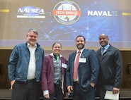 IMAGE: Naval Surface Warfare Center Dahlgren Division Potomac Tech Bridge Director Michael Clark (third from left) stands with Southern Maryland Tech Bridge Director Rick Tarr (left), Capital Tech Bridge Director Lauren Hanyhok (second from left) and Mid-Atlantic Tech Bridge Director Gerrold Walker (right) at the Potomac Tech Bridge kickoff event Dec. 12 at University of Mary Washington Dahlgren Campus.