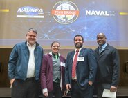 IMAGE: Naval Surface Warfare Center Dahlgren Division Potomac Tech Bridge Director Michael Clark (third from left) stands with Southern Maryland Tech Bridge Director Rick Tarr (left), Capital Tech Bridge Director Lauren Hanyhok (second from left) and Mid-Atlantic Tech Bridge Director Gerrold Walker (right) at the Potomac Tech Bridge kickoff event Dec. 12 at University of Mary Washington Dahlgren Campus.