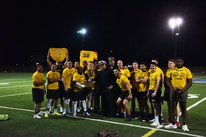 U.S. Army flag football team member warms up before the Army vs Navy game at Mathis Field, Goodfellow Air Force Base, Texas Dec. 8, 2023. The Army–Navy game is one of college football's most traditional and enduring rivalries. (U.S. Air Force photo by Airman James Salellas)