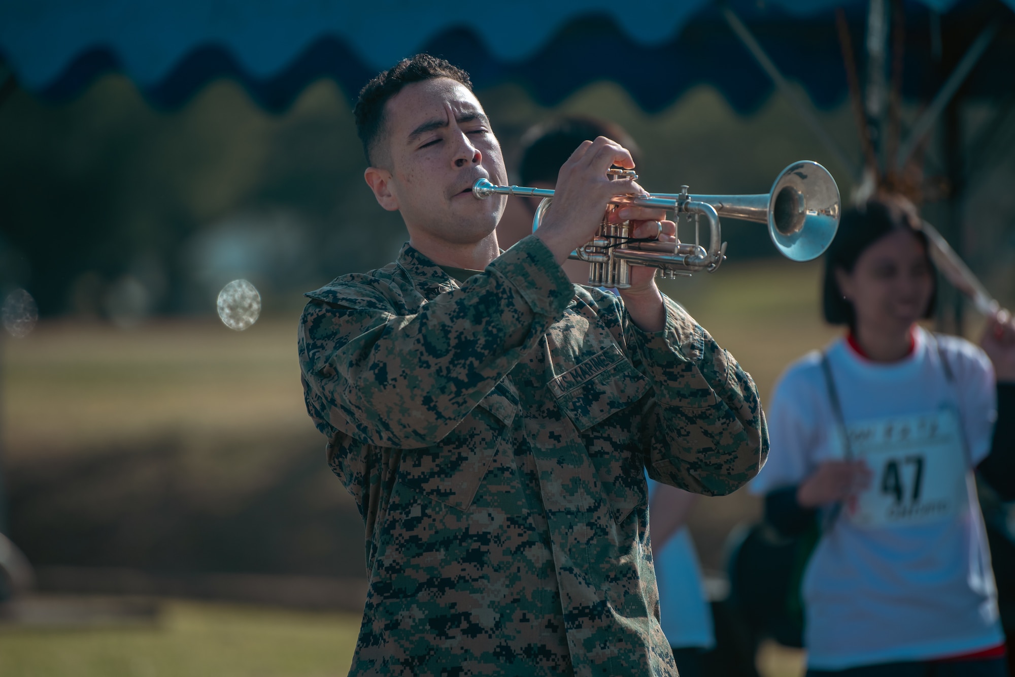 A Marine performs.