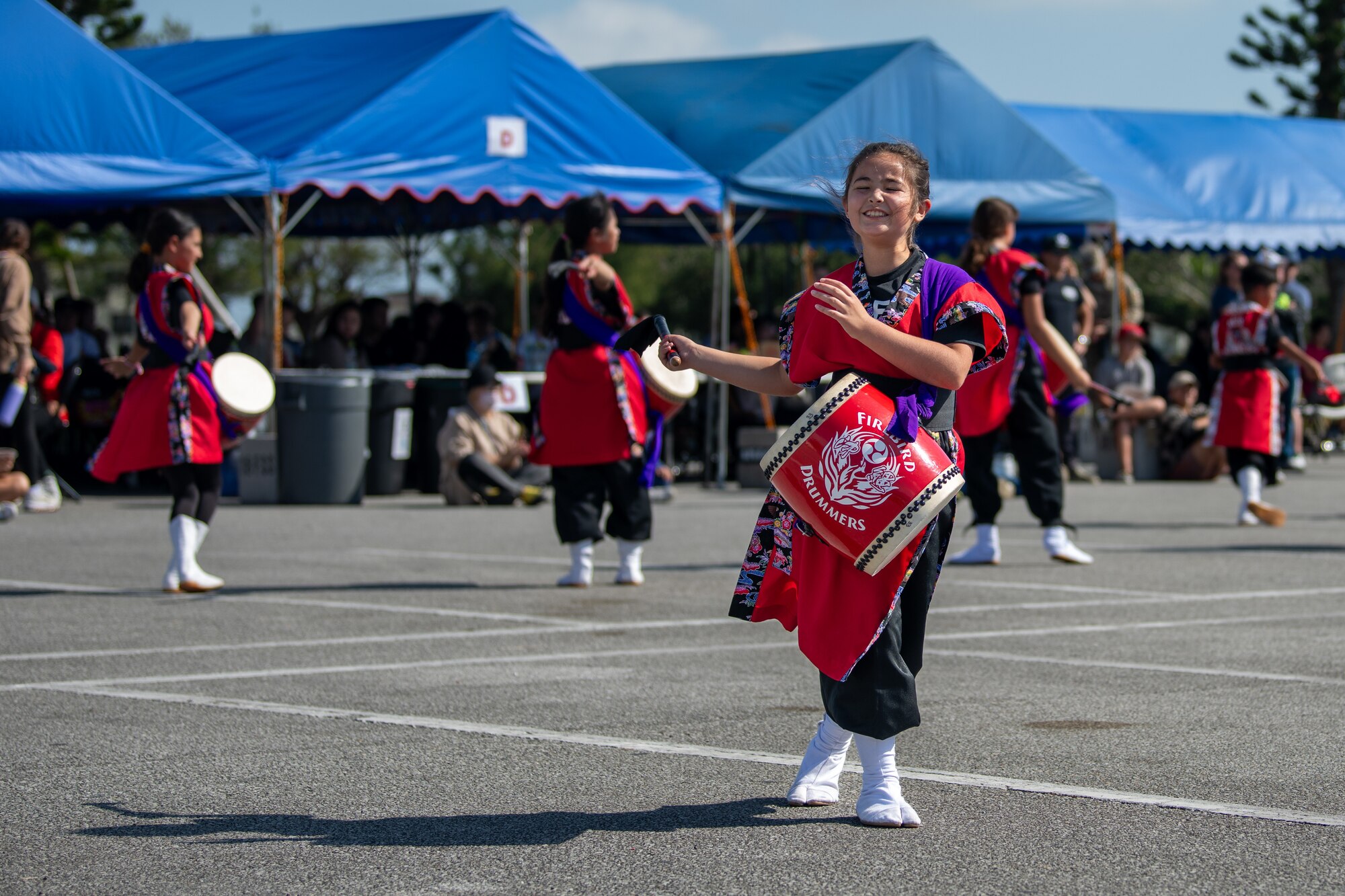 Drummers perform.