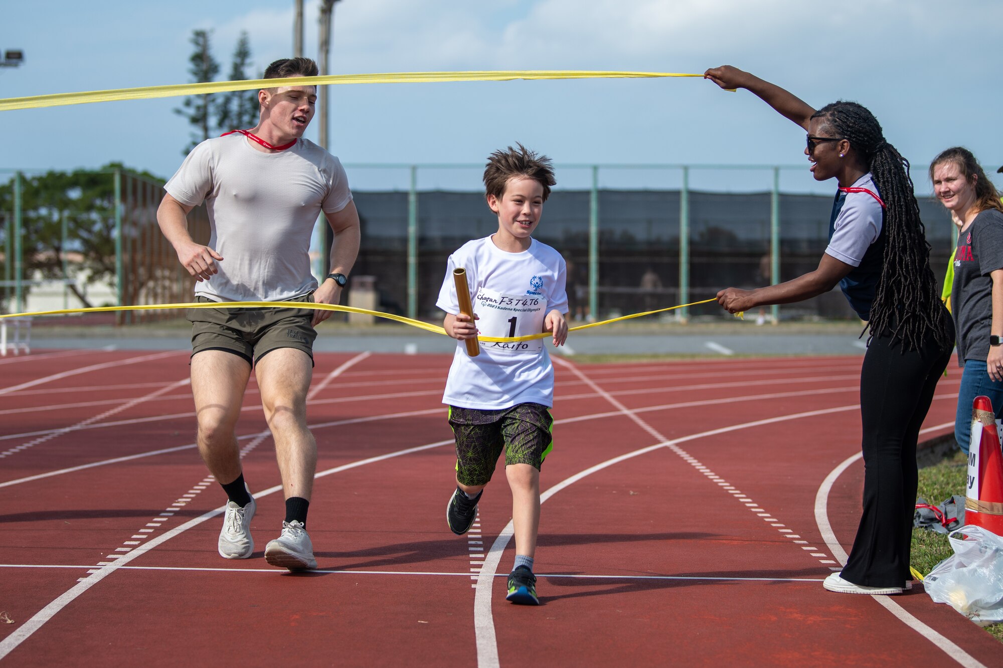An athlete runs.