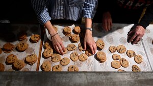 San Angelo community members bake cookies to hand out at the annual Cookie Caper at Goodfellow Air Force Base, Dec. 4, 2023. The San Angelo Chamber of Commerce and local businesses have teamed up annually since 2016 with the 17th Training Wing to bake and deliver cookies every December for students and junior military members. (U.S. Air Force photo by Airman 1st Class Zach Heimbuch)