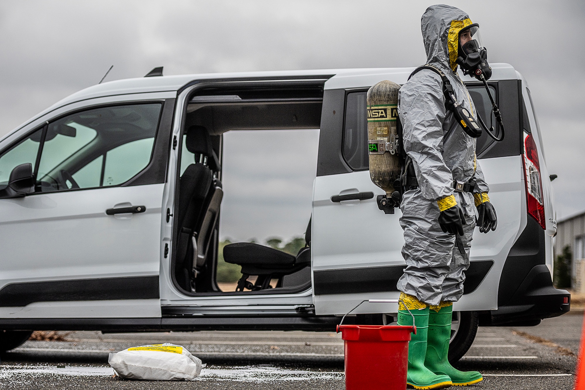 Airman 1st Class Diego Vidal, 87th Civil Engineer Squadron Emergency Management, prepares to collect test samples of a potentially hazardous material during Jersey Dawn 23 on Joint Base McGuire-Dix-Lakehurst, N.J., Dec. 7, 2023. Members assigned to several units across the joint base participated in the exercise, a six-day joint training event from Dec. 4-9, 2023. (U.S. Air Force photo by Staff Sgt. Austin Knox)