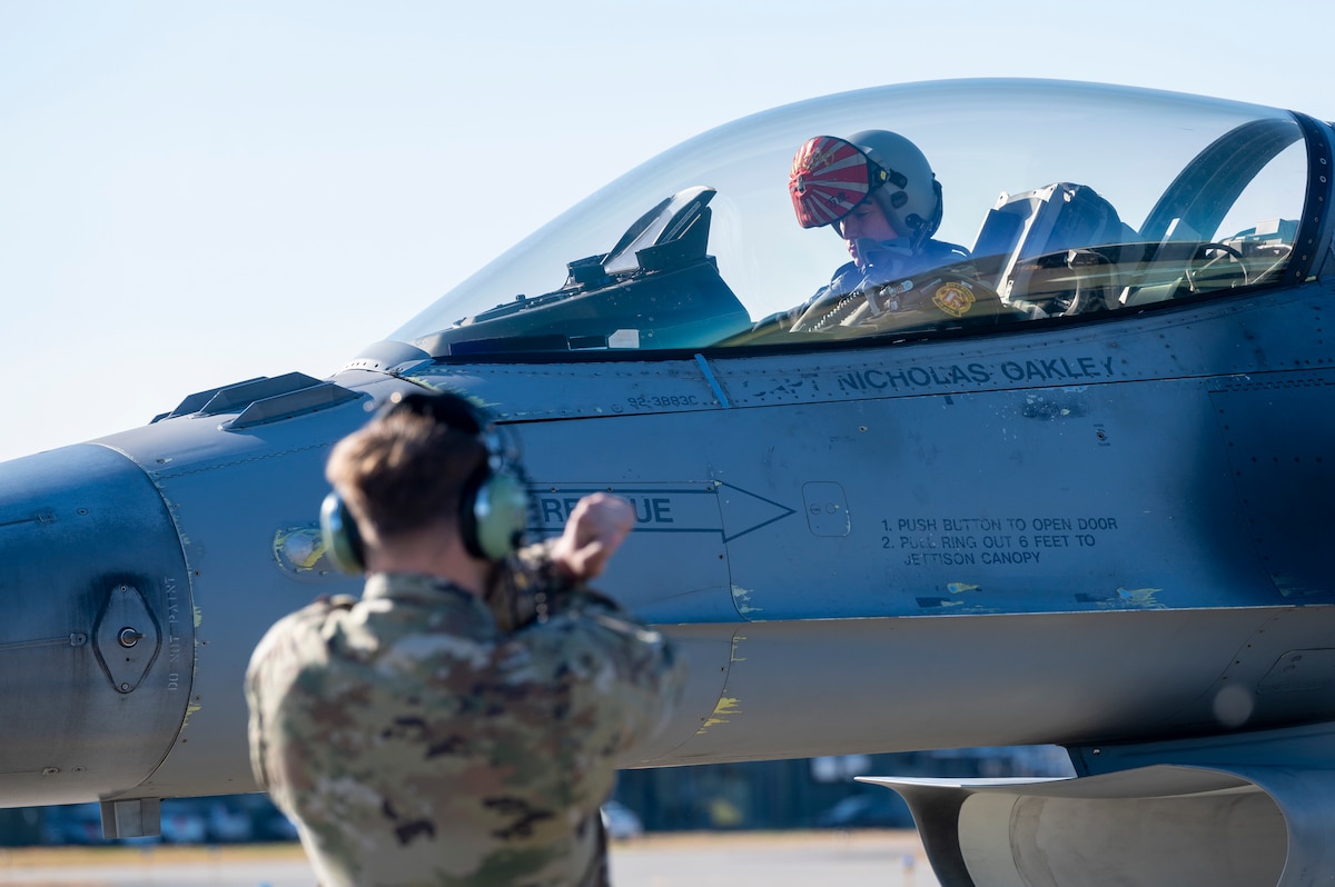 U.S. Air Force Capt. Jacob Tate, 14th Fighter Squadron fighter pilot, runs through starting procedures of an F-16 Fighting Falcon during a PAC WEASEL Exercise at Misawa Air Base, Japan, Dec. 8, 2023.